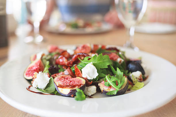 Plate with salad on a restaurant table. 