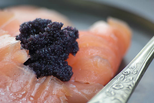 istock Black caviar and smoked salmon. 467376440
