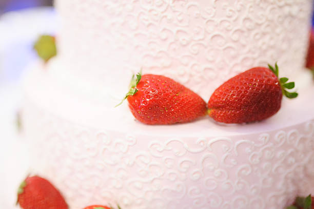 istock sweet Wedding cake decorated with tasty strawberries 467378908