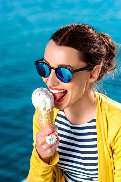 istock Woman with ice cream 467382178