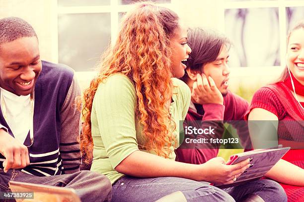 Education Multiethnic Group Of College Students Hang Out Digital Tablet Stock Photo - Download Image Now