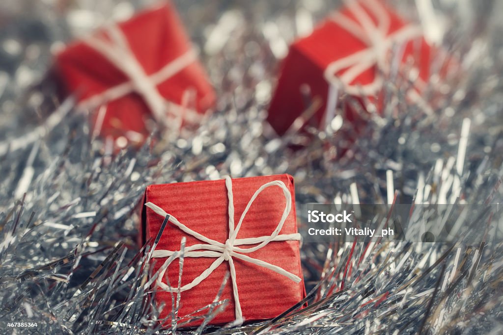 Close up of red gift boxes in abstract christmas decoration 2015 Stock Photo