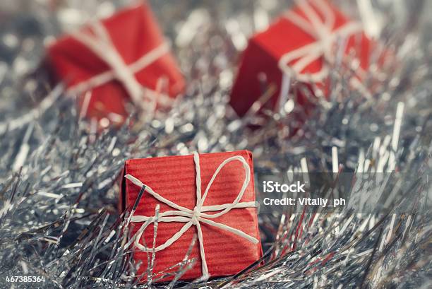 Close Up Of Red Gift Boxes In Abstract Christmas Decoration Stock Photo - Download Image Now