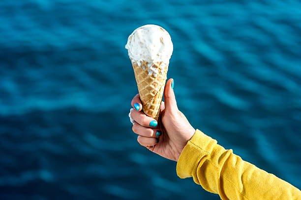 istock Woman with ice cream 467387580