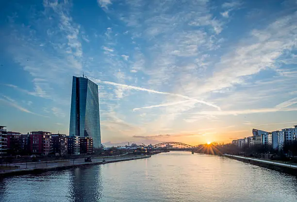 The European Central Bank sky scraper in the financial city of Frankfurt am Main, Germany. Riverside at the morning sunrise.
