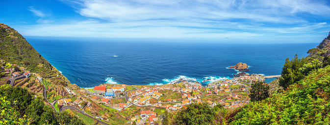 Elevated panoramic view on teh beautiful town of Porto Moniz in Northern Maderia