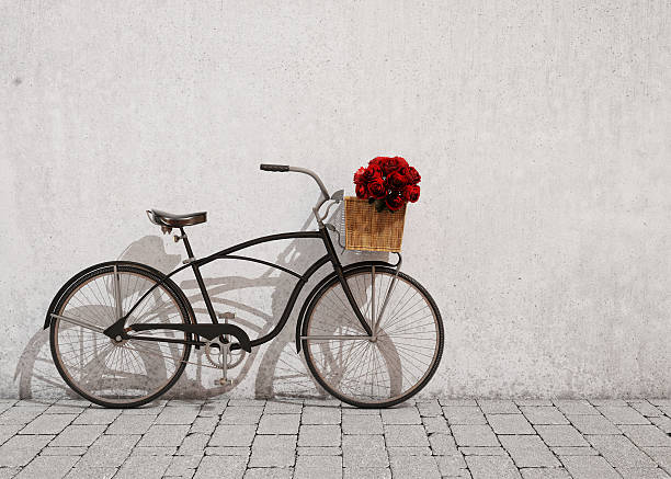 istock red retro bicycle with basket and flowers 467392490