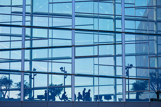 business people in stylish modern office building with glass walls - copenhagen business bildbanksfoton och bilder