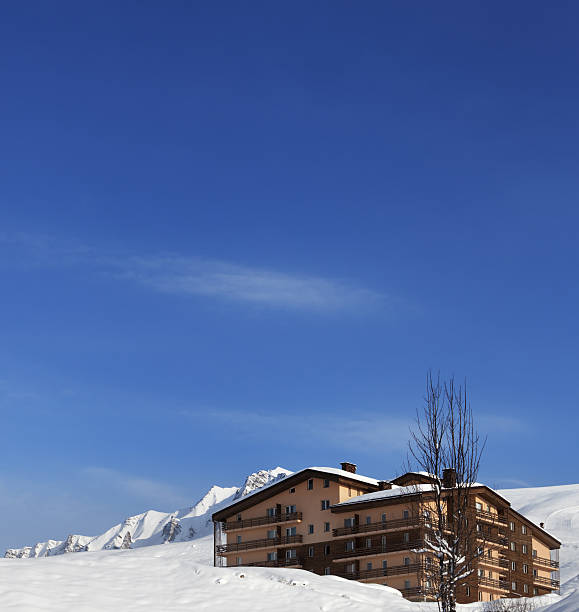 istock Hotel in winter mountains 467393317