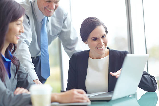 istock She's showing them some of the latest figures 467393517