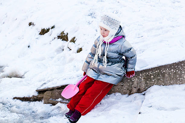 istock Little girl playing outdoors in winter 467395072