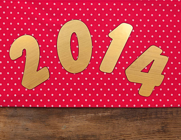 istock 2014 new year on red polka dot background 467395141