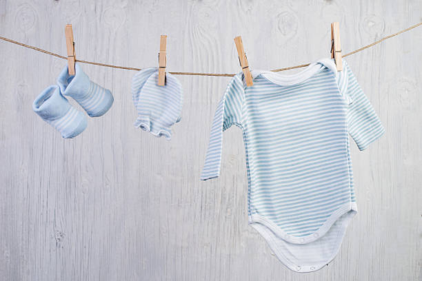 istock Baby laundry hanging on a clothesline 467395514