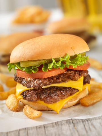 A double cheeseburger with all the fixings - Photographed on Hasselblad H3D2-39mb Camera