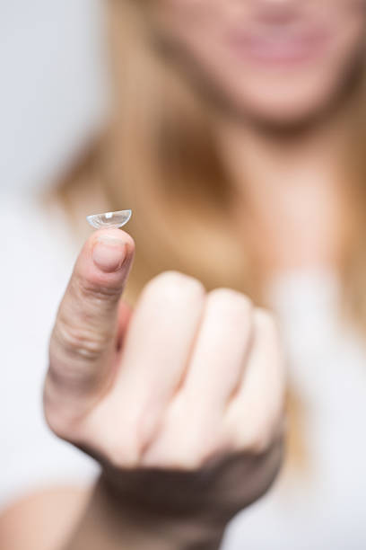 istock Contact lens on a finger 467398496