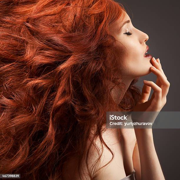 Beautiful Woman With Curly Hairstyle Against Gray Background Stock Photo - Download Image Now