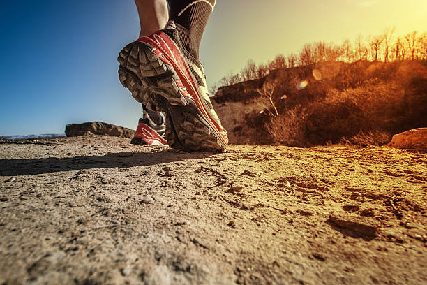 istock Man running on a trail on a hill 467398870