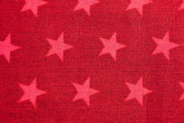 istock Pink stars on red background 467398924