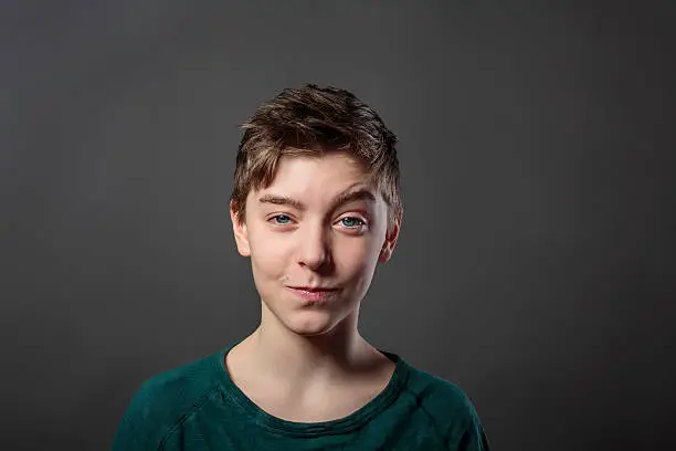 Photo of portrait of a smiling teenage boy