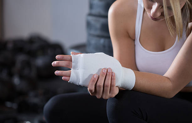 istock Woman with injured wrist 467399580
