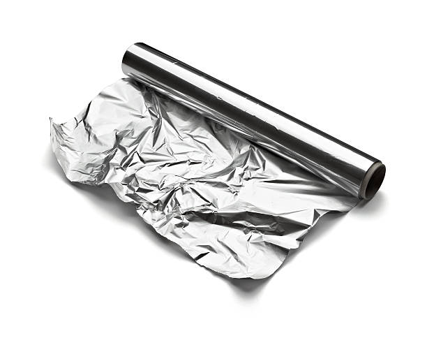 papier aluminium - rolled up foil paper gray photos et images de collection