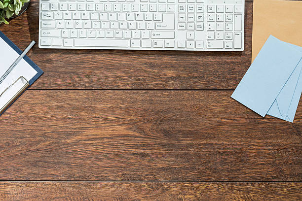istock Keyboard on wooden desk 467403268