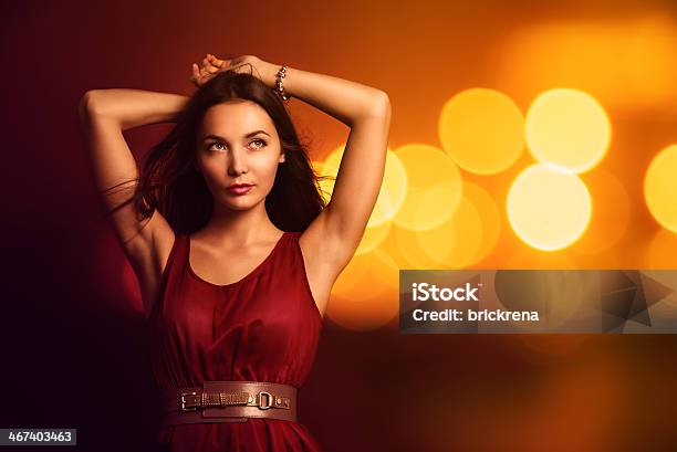 Beautiful Young Woman Over Bright Night Lights Stock Photo - Download Image Now - Adult, Adults Only, Beautiful People