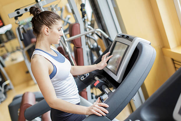 istock Young woman training in the gym 467414281