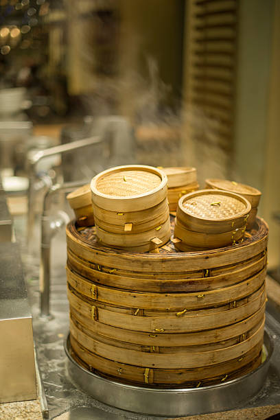 istock One huge Chinese bamboo steamer and several small ones 467425358