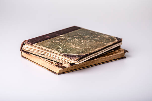 istock Beautiful old two books closeup on white background 467428747