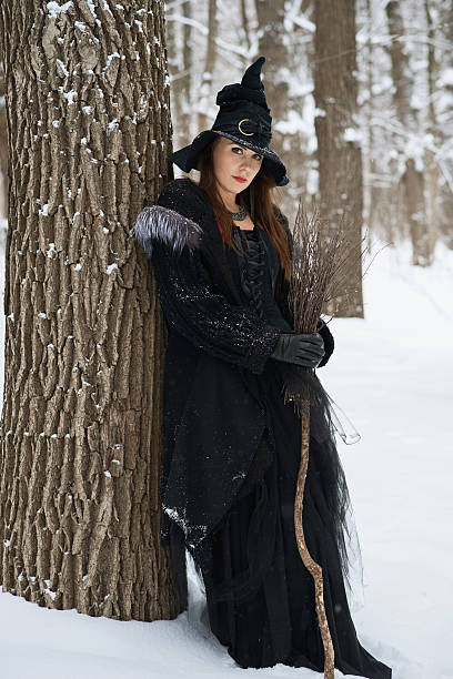 istock woman in witch's hat 467428950