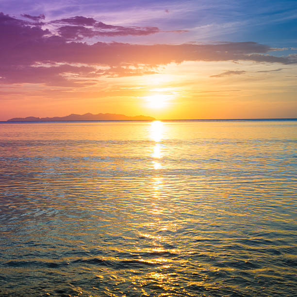 istock A majestic sunset just above the ocean's horizon 467429002