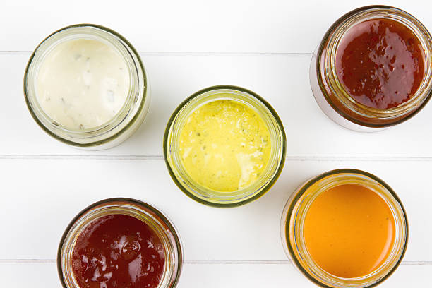 istock top-view of five jars filled with sauces 467434291