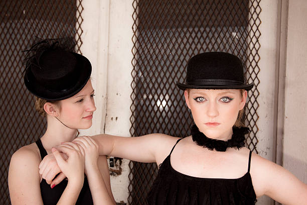 istock Pair of jazz ballet dancers wearing costume pose for camera. 467436710