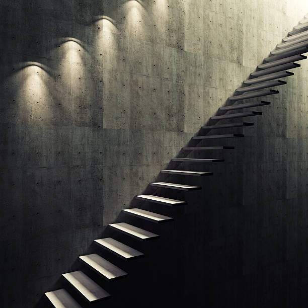 istock Abstract concrete stairway to the light 467439011