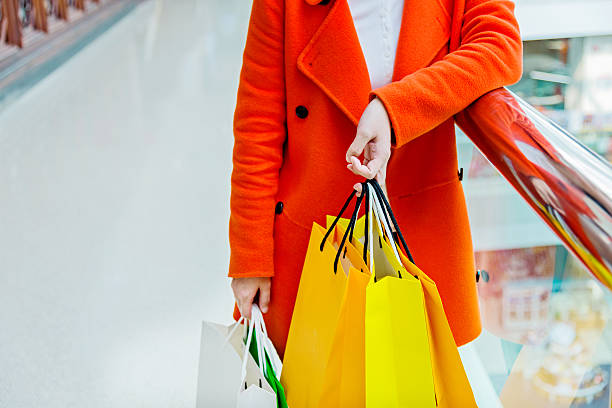 istock holding shopping bags 467440180