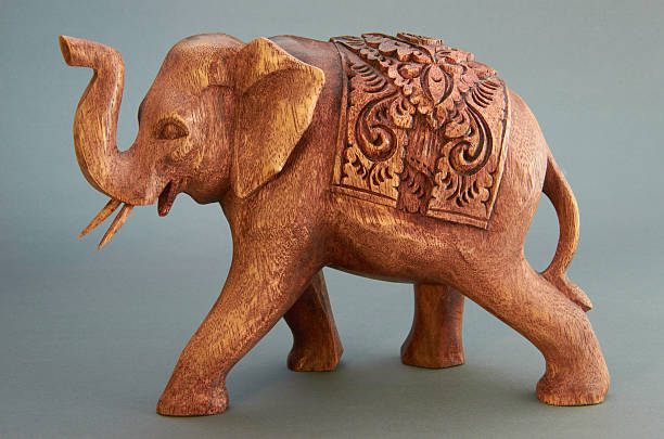 istock The figure of elephant made from tree. 467441563