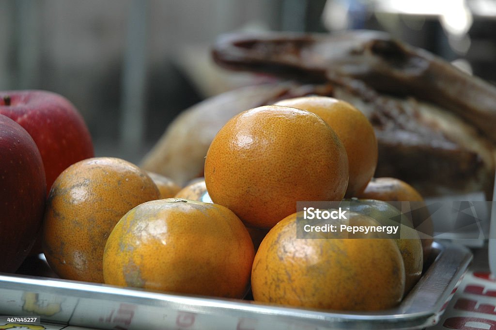 Sacrificial Offering Food and fresh fruits in tray, used as sacrificial offering to god in Chinese New Year. Altar Stock Photo