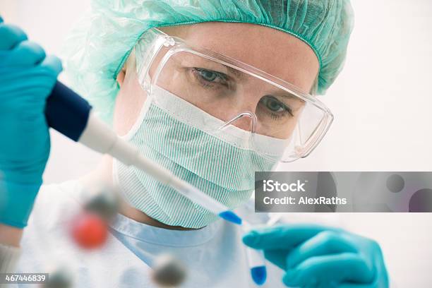 Working At The Laboratory Stock Photo - Download Image Now - Beaker, Biochemistry, Biology
