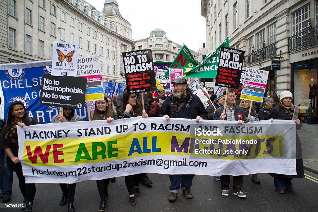 We Are All Migrants London UK - 21st March 2015: The Stand Up to Racism & Facism march through London. Anti-racism Stock Photo