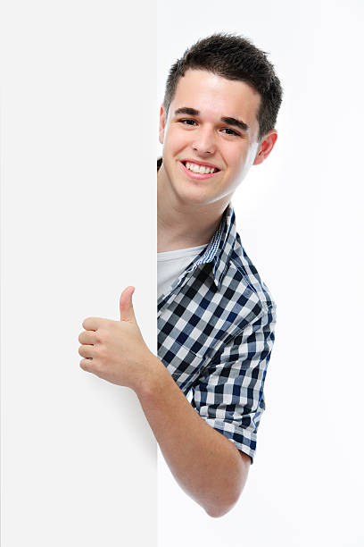 istock smiling teenager shows a thumbs up 467448699