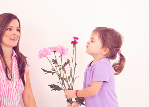 Mother and daughter with flowers