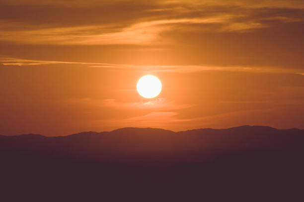 istock circle sunset. Image toned in vintage instagram colors. 467455074