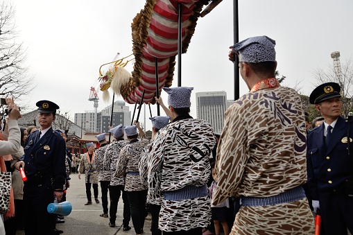 Tokyo, Japan - March 18, 2015: Participants and spectators during the annual Kinryu-no-mai (Golden Dragon Dance) festival in Asakusa.