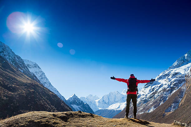 istock Hiker with backpack standing on top of a mountain 467455472