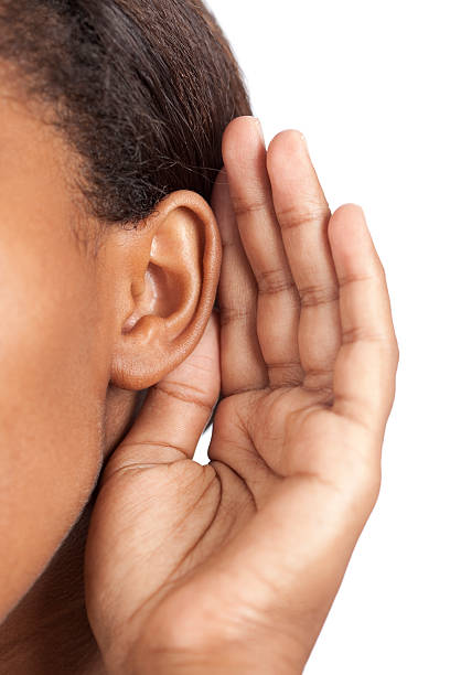 聞くます。 - listening human ear communication human hand ストックフォトと画像