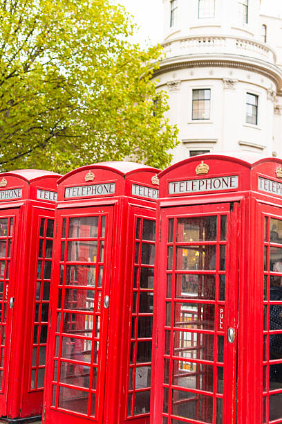 istock Red telephone booths in London 467458191