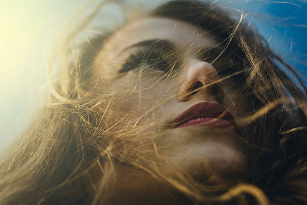 istock Low angle portrait of young beautiful female 467459822