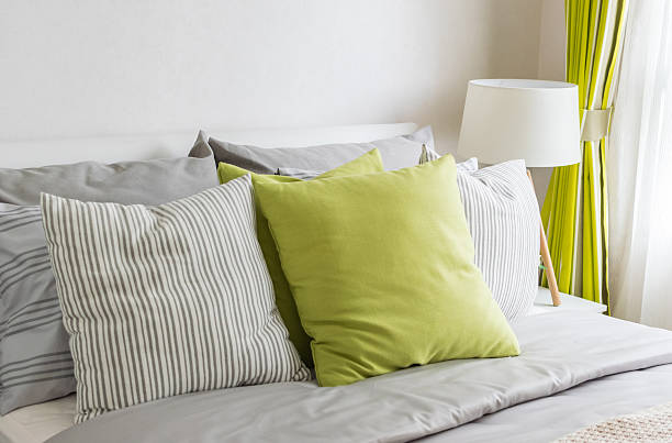 istock modern bedroom with green pillow on bed 467460852