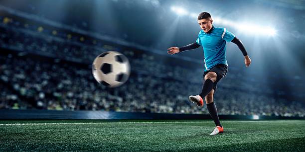 istock Professional football player soloing on the stadium 467462433
